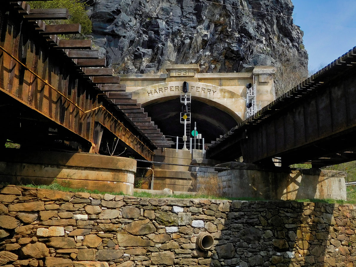 Facing into the Harpers Ferry railroad tunnel from below the tracks.